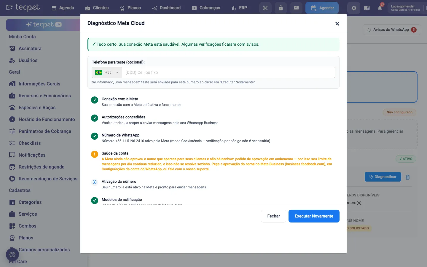 Janela Diagnóstico Meta Cloud com as checagens listadas, uma delas em laranja explicando que a Meta ainda não aprovou o nome de exibição e por isso o limite diário segue reduzido.